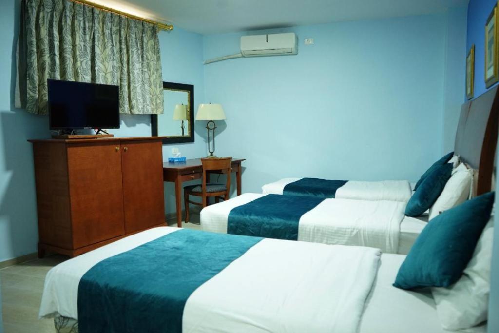 Conord Hotel Amman Bagian luar foto