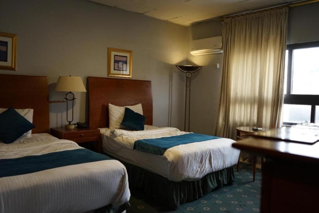 Conord Hotel Amman Bagian luar foto